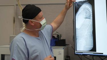An image from the "Cervico-Thoracic Deformity with Associate Professor Mitchell Hansen" playlist on the JnJInstitute.com website.