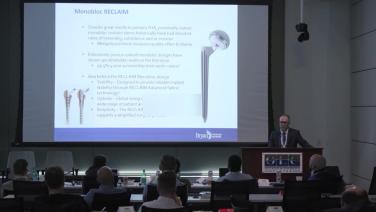 A presenter from "RECLAIM Modular Revision Hip System Overview with Steve Shannon, MD"
