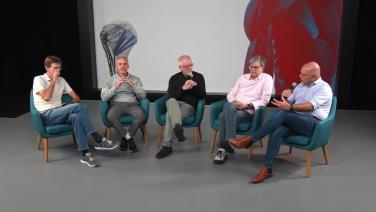 The Panel speakers sitting together on a stage speaking from Proximal Humerus Fractures using the VOLT Variable-Angle Optimized Locking Technology with Mr. Simon Lambert; Prof. Dr. Frank Beeres; Dr. Martin Jaeger; Prof Dr. Stefan Nijs; Prof. Dr. Harry Hoyen