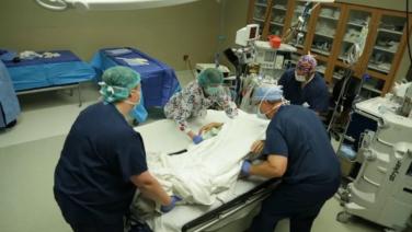 An image of the "Theresa's Outpatient Story with Mark Gittins, MD" video.