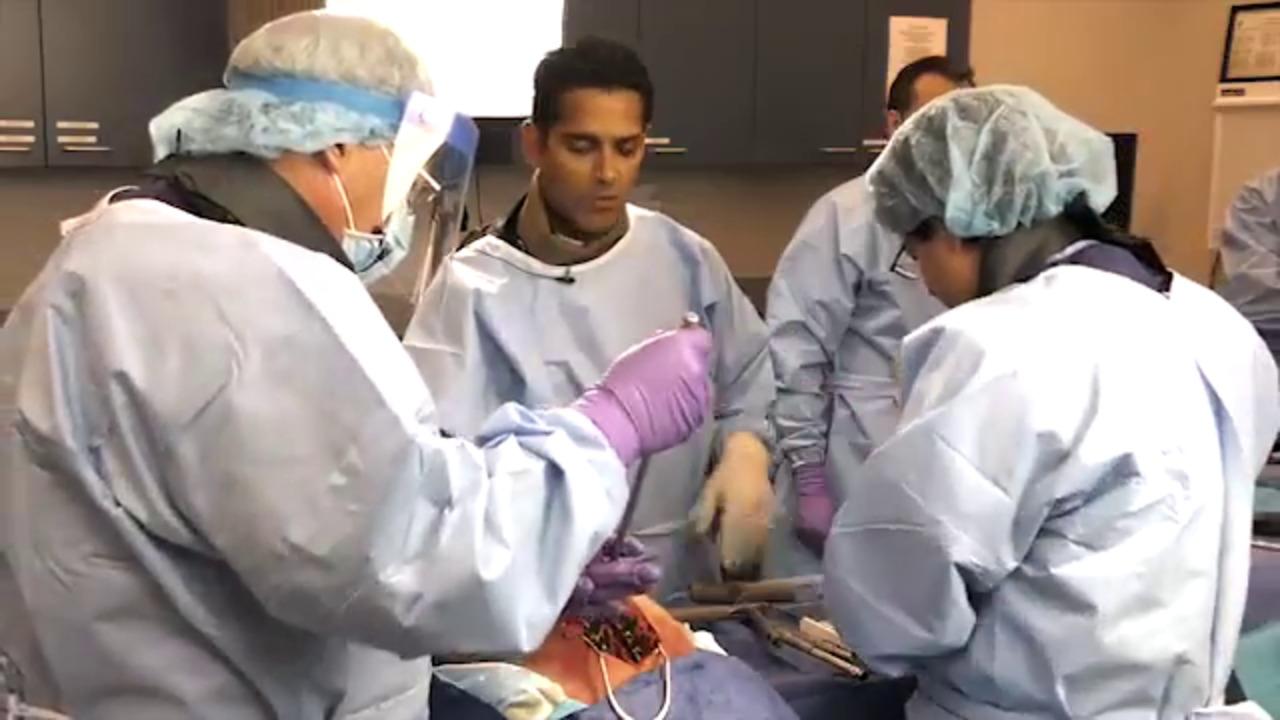 An image of the "EXPEDIUM VERSE® System - Deformity Correction through Translation with Randal Betz, MD, Baron Lonner, MD, and Suken Shah, MD" video on the JnJInstitute.com website.